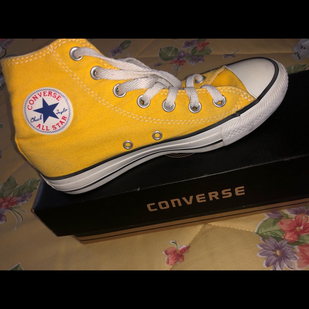 Yellow high top converse